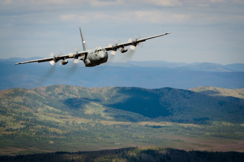 A Kentucky Air National Guard C-130 flies over Alaska on May 9, 2014, in support of Exercise Red Flag-Alaska. More than 100 Kentucky Airmen from the 123rd Airlift Wing participated in the exercise from May 7 to May 23. Red Flag-Alaska is designed to hone the combat skills of U.S. Air Force flight crews. (U.S. Air National Guard photo by Master Sgt. Phil Speck)