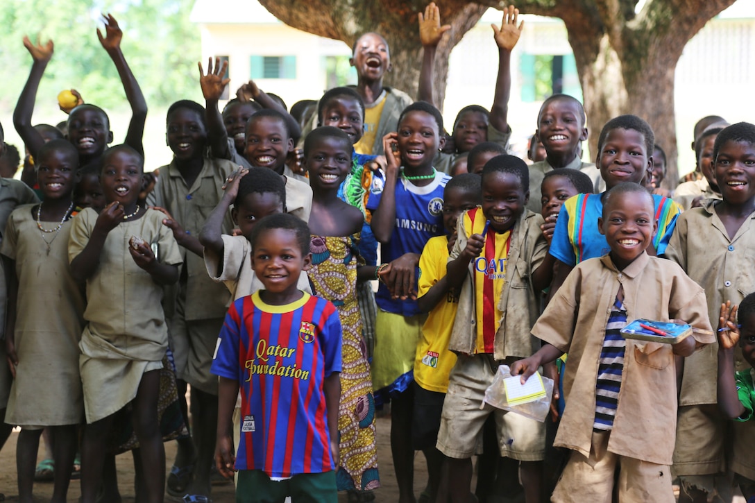 Students in the village of Atome, Togo, look forward to receiving their new school as a gift from the people of the U.S., in late 2014. The U.S. Embassy in Lome, U.S. Africa Command and U.S. Army Corps of Engineers Europe District partnered to deliver six new schools to the children of Togo. The projects are being executed through the Department of Defense's AFRICOM humanitarian assistance program to improve future prospects for Togolese youth.