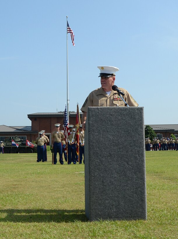 Sgt. Maj. Conrad E. Potts, outgoing sergeant major, Marine Corps Logistics Base Albany, speaks to the audience during his retirement ceremony held on Schmid Field, May 23.