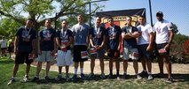Marines from 1st Battalion, 1st Marine Regiment, stand together after the completion of the 16th annual City of Laguna Hills Memorial Day half Marathon, 10k and 5k May 26, 2014. The race honored those who are currently serving, those who have served and those who have made the ultimate sacrifice. The event also raised awareness and support from the local community for 3rd Battalion, 5th Marine Regiment, or "Dark Horse Battalion," with a portion of the event proceeds going to the battalion's support committee.