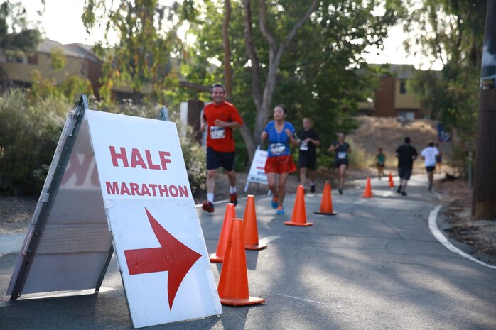 Competitors make their way to the half-way point during the 16th annual City of Laguna Hills Memorial Day half marathon, 10k and 5k May 26, 2014. The race honored those who are currently serving, those who have served and those who have made the ultimate sacrifice. The event also raised awareness and support from the local community for 3rd Battalion, 5th Marine Regiment, or "Dark Horse Battalion," with a portion of the event proceeds going to the battalion's support committee.