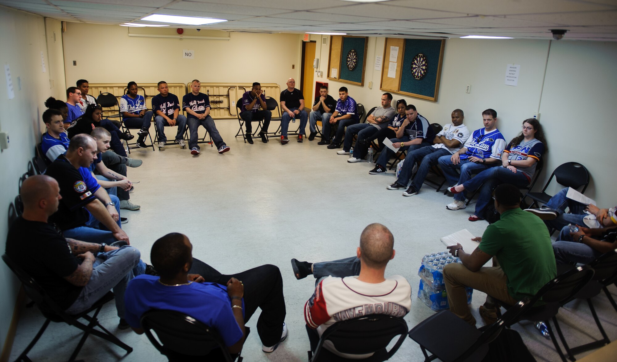 Airmen from wing staff agencies participate in a group discussion during the 2014 Sexual Assault Prevention and Response down day at Kunsan Air Base, Republic of Korea, May 22, 2014. The Wolf Pack halted operations for the day and Airmen attended an all-call, participated in a ‘silent walk’ and had group discussions to address and discuss sexual assault in the military. (U.S. Air Force photo by Senior Airman Armando A. Schwier-Morales/Released)