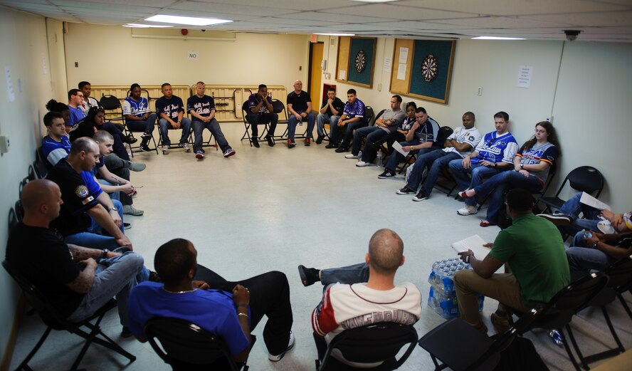 Airmen from wing staff agencies participate in a group discussion during the 2014 Sexual Assault Prevention and Response down day at Kunsan Air Base, Republic of Korea, May 22, 2014. The Wolf Pack halted operations for the day and Airmen attended an all-call, participated in a ‘silent walk’ and had group discussions to address and discuss sexual assault in the military. (U.S. Air Force photo by Senior Airman Armando A. Schwier-Morales/Released)