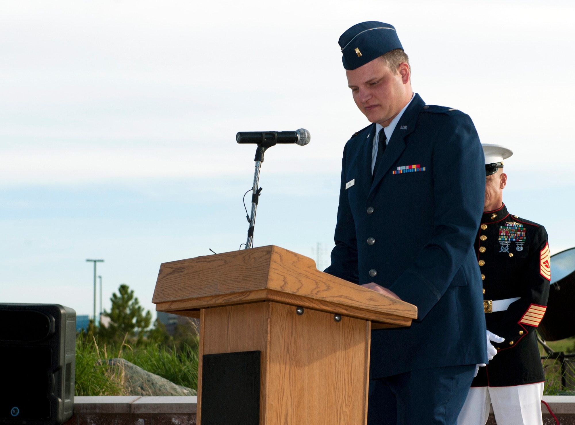 2nd Lt. Scot Kerns, 460th Space Wing chaplain candidate, gives his invocation during the Memorial Day event May 26, 2014, on Buckley Air Force Base, Colo. Giving invocations before events and ceremonies is only one of the many duties of a chaplain candidate. (U.S. Air Force photo by Airman Emily E. Amyotte/Released)