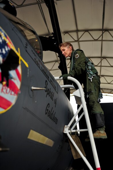 Col. Jeannie Leavitt, 4th Fighter Wing commander, climbs into an F-15E Strike Eagle aircraft, May 29, 2014, at Seymour Johnson Air Force Base, North Carolina.  Leavitt conducted her final flight as the wing commander and will relinquish command June 2.  (U.S. Air Force photo/Airman 1st Class Brittain Crolley)
