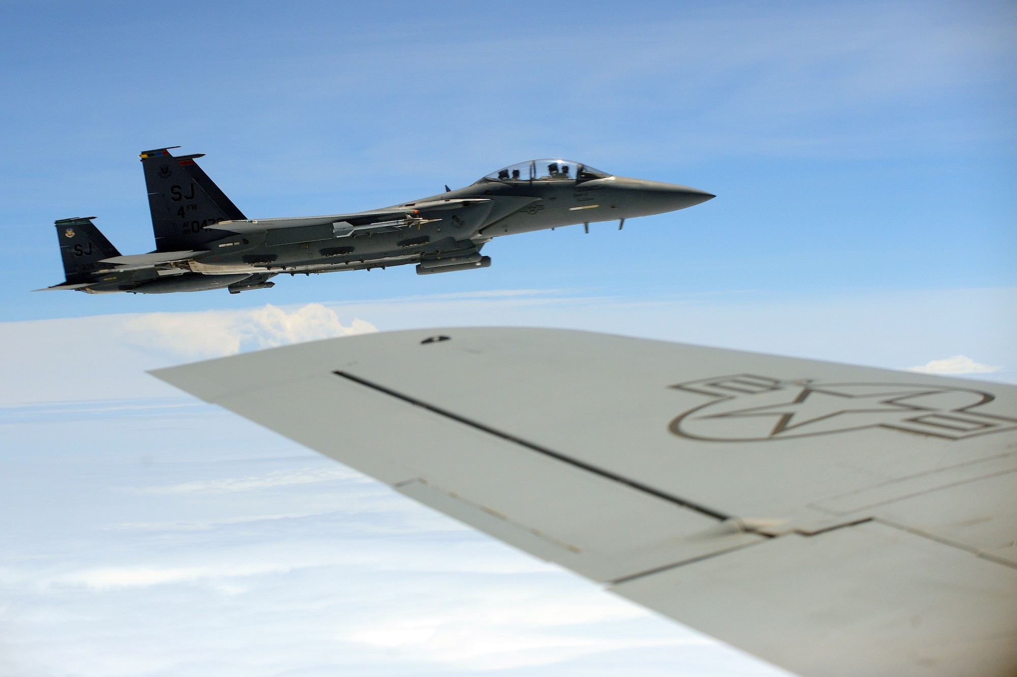 Col. Jeannie Leavitt, 4th Fighter Wing commander, flies with fellow 4th FW aircrew members for her fini-flight, May 29, 2014, over North Carolina. During her time at Seymour Johnson Air Force Base, Leavitt became the first female commander of an active duty fighter wing. (U.S. Air Force photo/Senior Airman John Nieves Camacho)