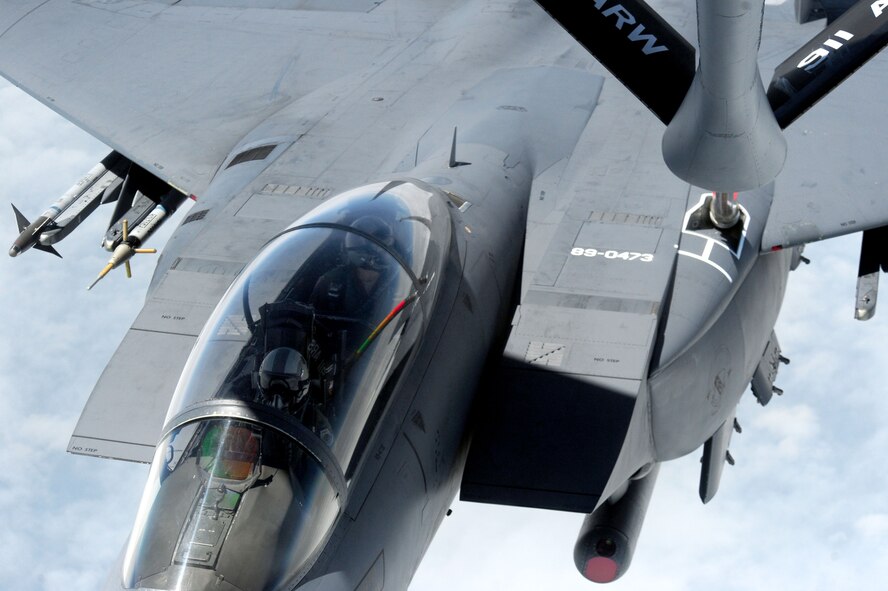 An F-15E Strike Eagle aircraft piloted by Col. Jeannie Leavitt, 4th Fighter Wing commander, receives fuel from a KC-135R Stratotanker during her fini-flight, May 29, 2014, over North Carolina. During her career as the first female fighter pilot, Leavitt recorded more than 2,600 flying hours in the F-15E Strike Eagle. (U.S. Air Force photo/Senior Airman John Nieves Camacho)