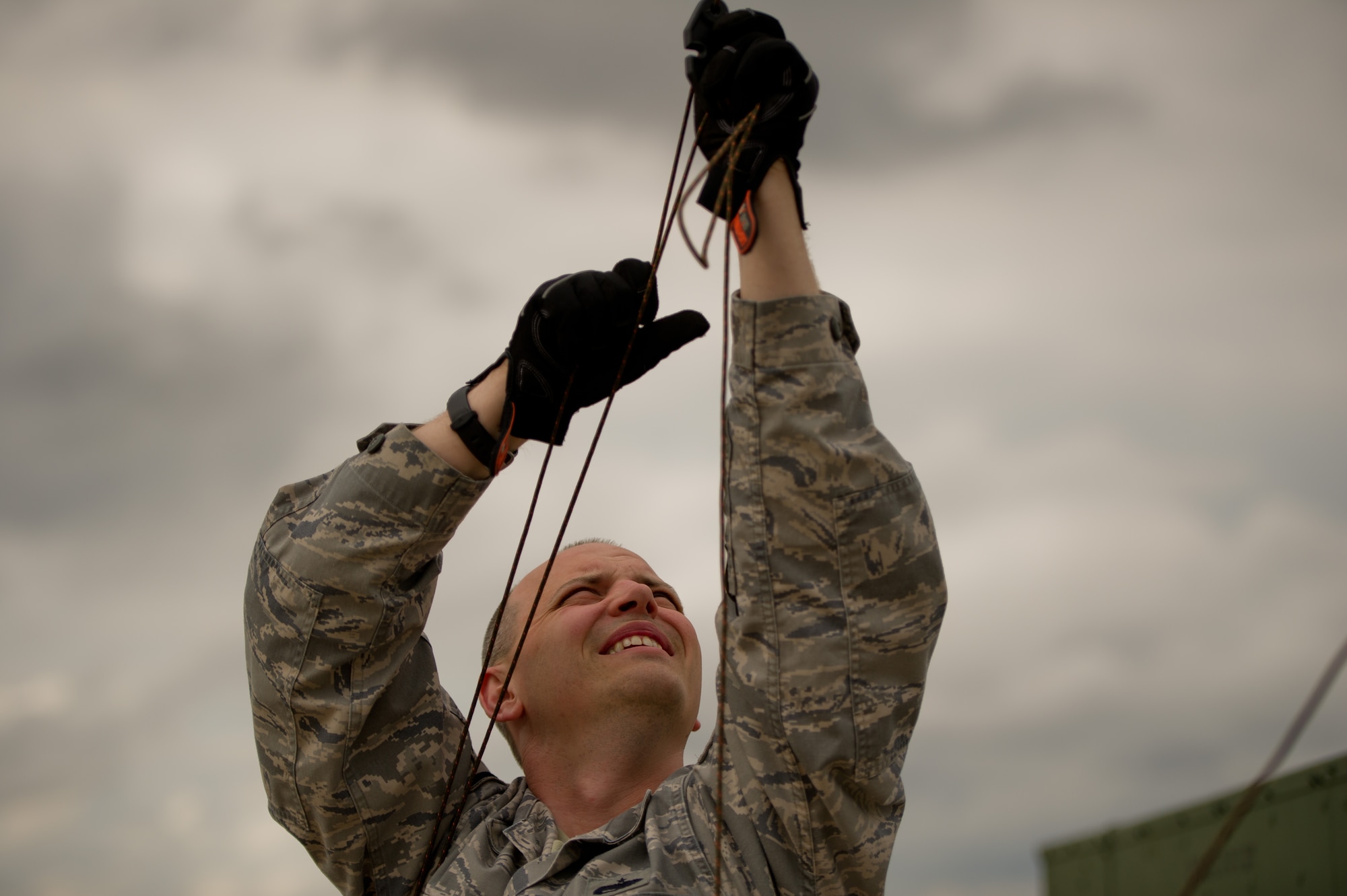 U.S. Air Force Master Sgt. Joe Verant, communications craftsman, 315th Airlift Control Flight, Joint Base Charleston, S.C., tightens up guylines for a line-of-sight radio antenna during Maple Flag 47 in Edmonton/Cold Lake, Alberta, Canada, May 26, 2014. Maple Flag is an international exercise designed to enhance the interoperability of C-130 aircrews, maintainers and support specialists in a simulated combat environment. (U.S. Air Force photo by Tech. Sgt. Matthew Smith/Released)