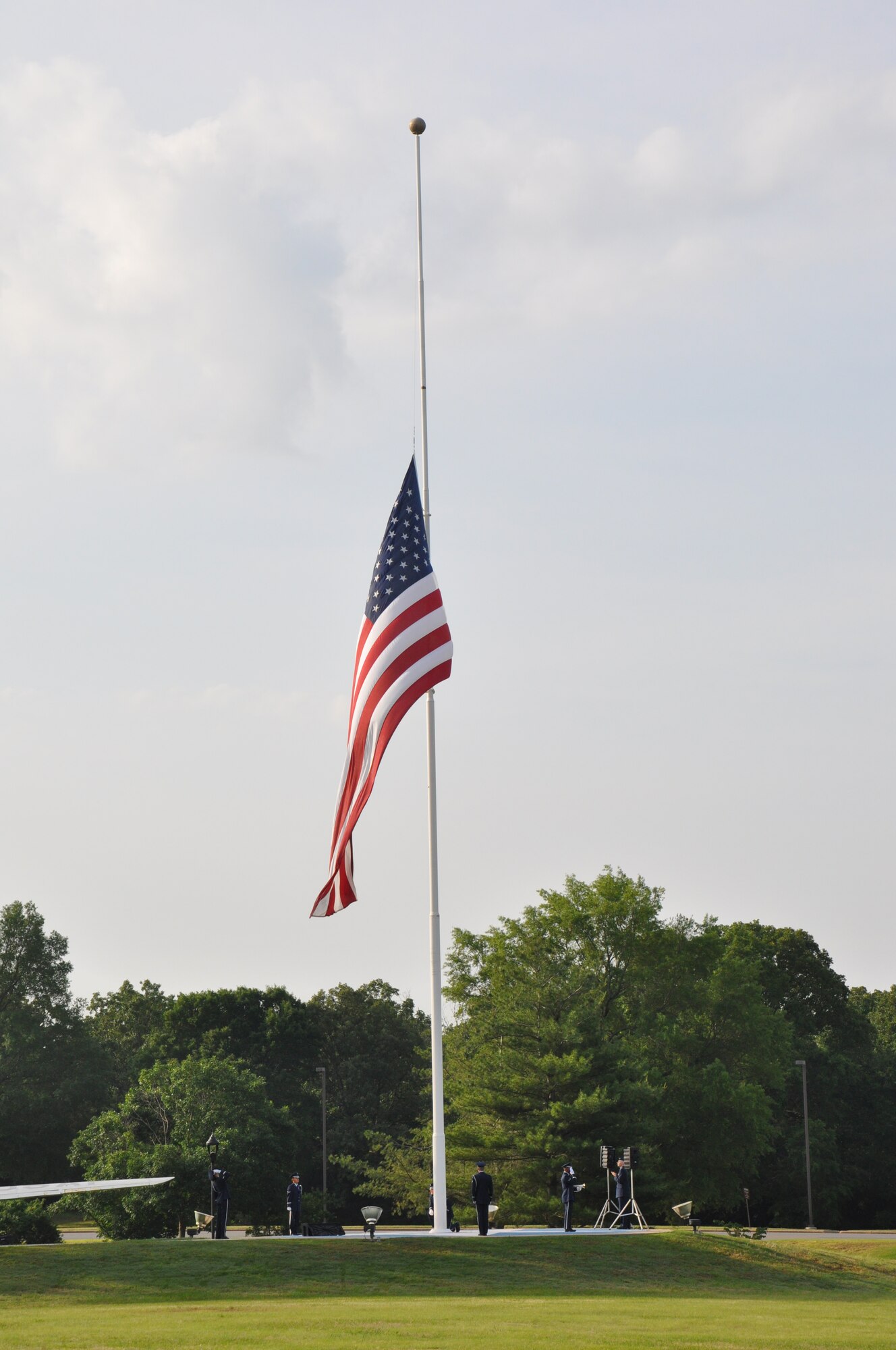 Little Rock Air Force Base’s Honor Guard lowers the flag to half-staff during a wreath-laying ceremony May 26, 2014, at Little Rock AFB, Ark. The flag is lowered to half-mast in observance of the men and women who have died while serving in the military. (U.S. photo by Airman 1st Class Scott Poe) 