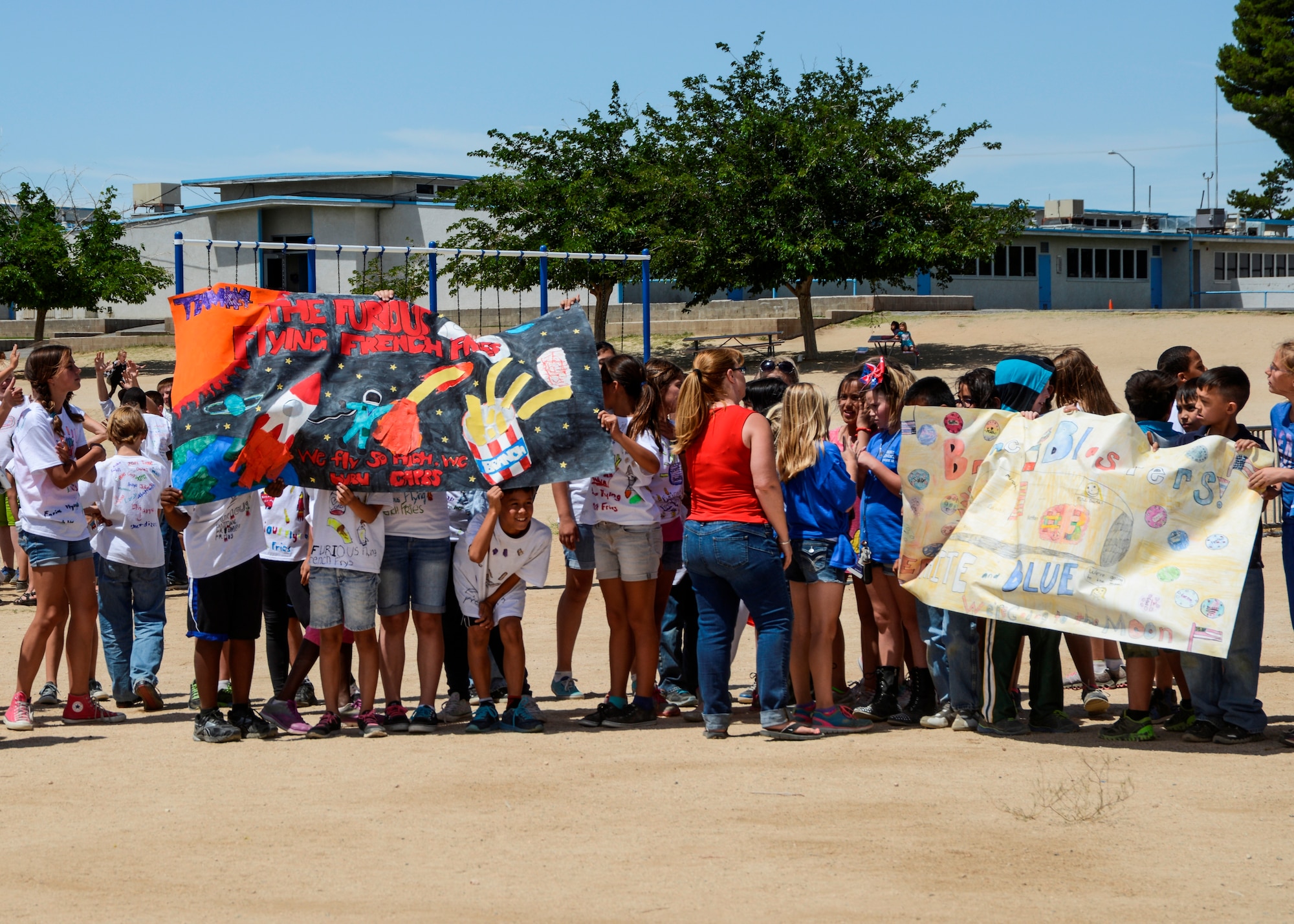 In addition to their rocket design, each team was responsible for creating a banner and t-shirt design, which reflected their team’s theme. (U.S. Air Force photo by Rebecca Amber)
