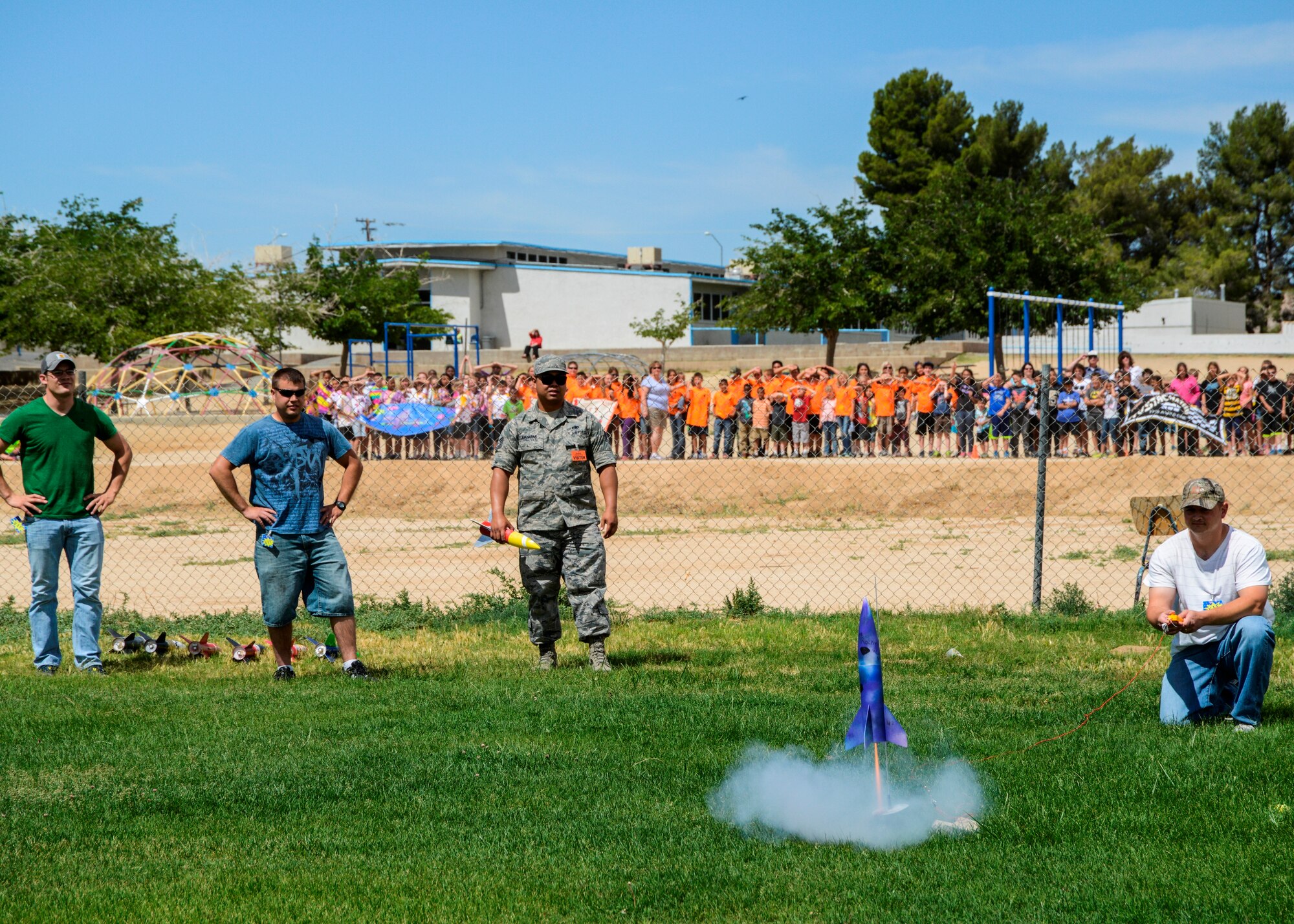 Branch Elementary School students watched from the playground as their rockets soared in the school’s second annual Rocket Challenge. (U.S. Air Force photo by Rebecca Amber)

