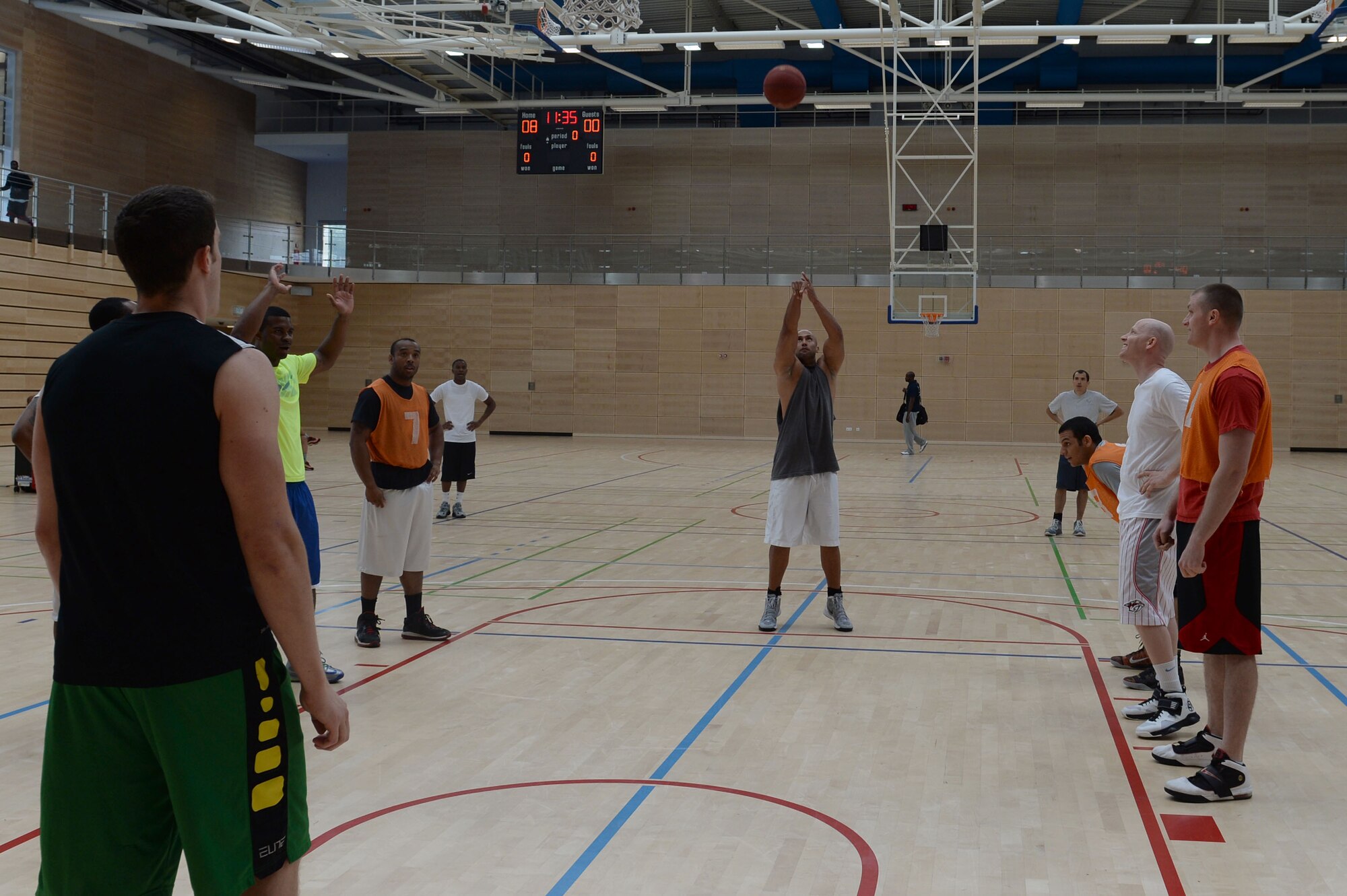 U.S. Air Force Tech. Sgt. Stephan Perryman, 52nd Component Maintenance Squadron program NCO in charge from Colorado Springs, Colo., shoots a free throw during a wing sports day basketball tournament at Spangdahlem Air Base, Germany, May 29, 2014. Wing sports days encourage fitness, unit morale and fun. (U.S. Air Force photo by Senior Airman Alexis Siekert/Released)