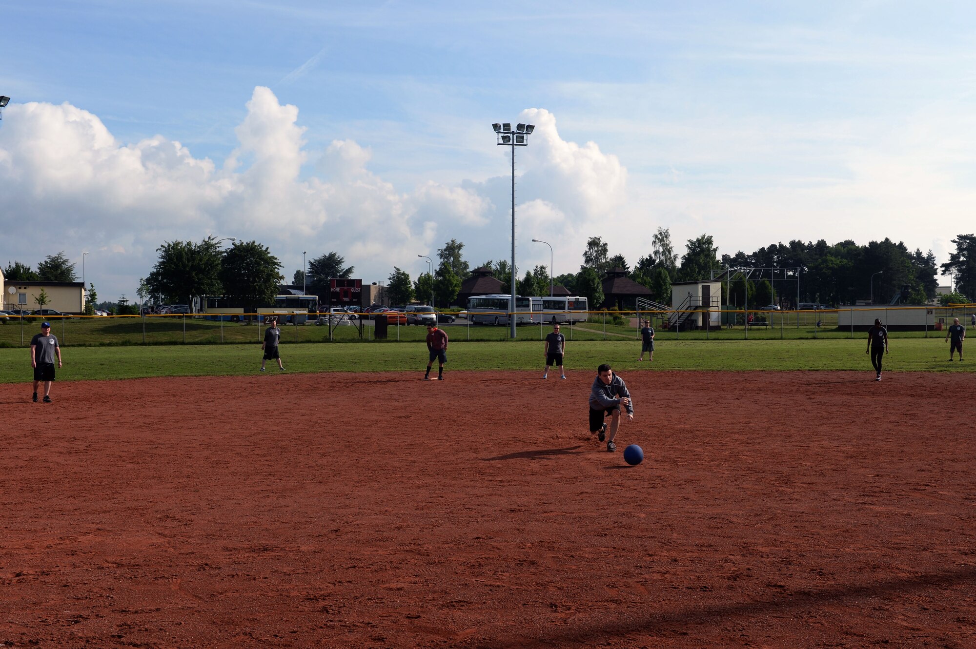 U.S. Air Force Senior Airman Jonathan Neff, 726th Air Mobility Squadron unit deployment manager from Leitchfield, Ky., pitches a kickball during wing sports day at Spangdahlem Air Base, Germany, May 29, 2014.The 726th was eliminated in the first round of the tournament. (U.S. Air Force photo by Senior Airman Alexis Siekert/Released)