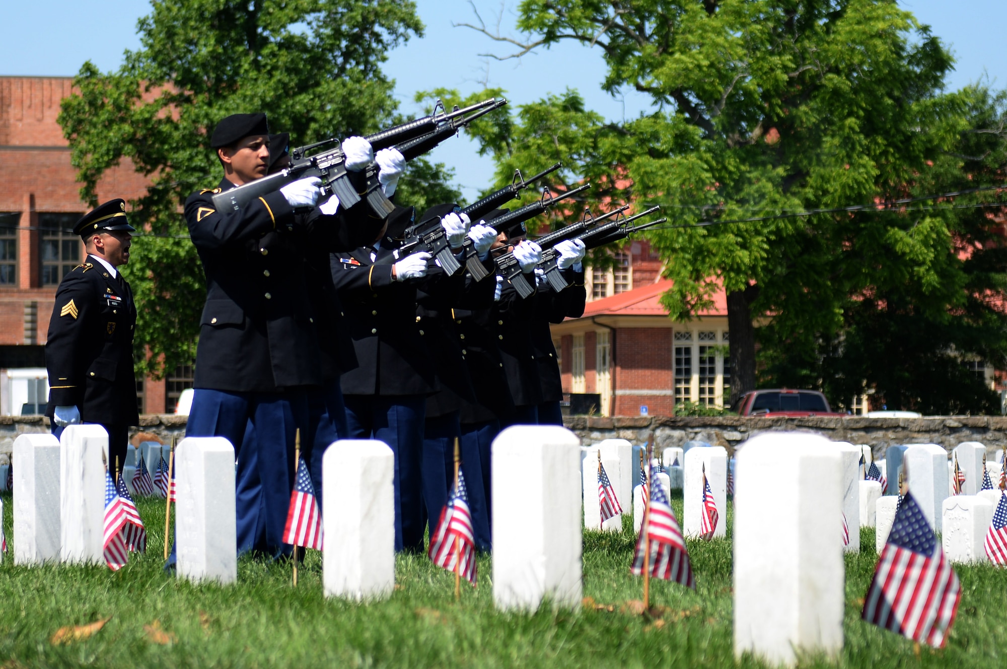 U.S. Army Soldiers from Fort Eustis, Va. provide a 3-volley salute during a Memorial Day ceremony in Hampton, Va., May 26, 2014. During the ceremony, U.S. military personnel and local community members honored the fallen, prisoners of war and  those missing in action who have served in conflicts across the world. (U.S. Air Force photo by Senior Airman Teresa J.C. Aber/Released)