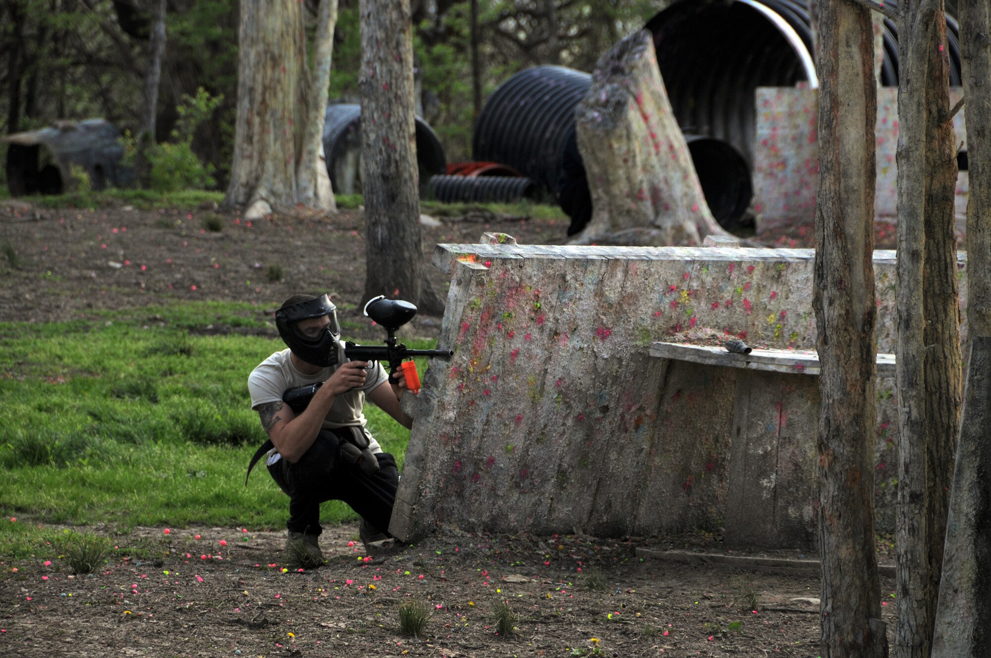 WRIGHT-PATTERSON AIR FORCE BASE, Ohio – A reservist from the 445th Airlift Wing takes part in a game of paintball during the wing's Single Airmen paintball game May 3 at the i70 Paintball in Huber Heights, Ohio. The event stemmed from the Single Airman Programming Initiative, a program that provides social and recreation opportunities through Force Support Squadron-sponsored events held during unit training assembly weekends. The program, which began rolling out around the Air Force last fall, is targeted toward officer and enlisted Airmen without a spouse. (U.S. Air Force photo/Tech. Sgt. Anthony Springer)