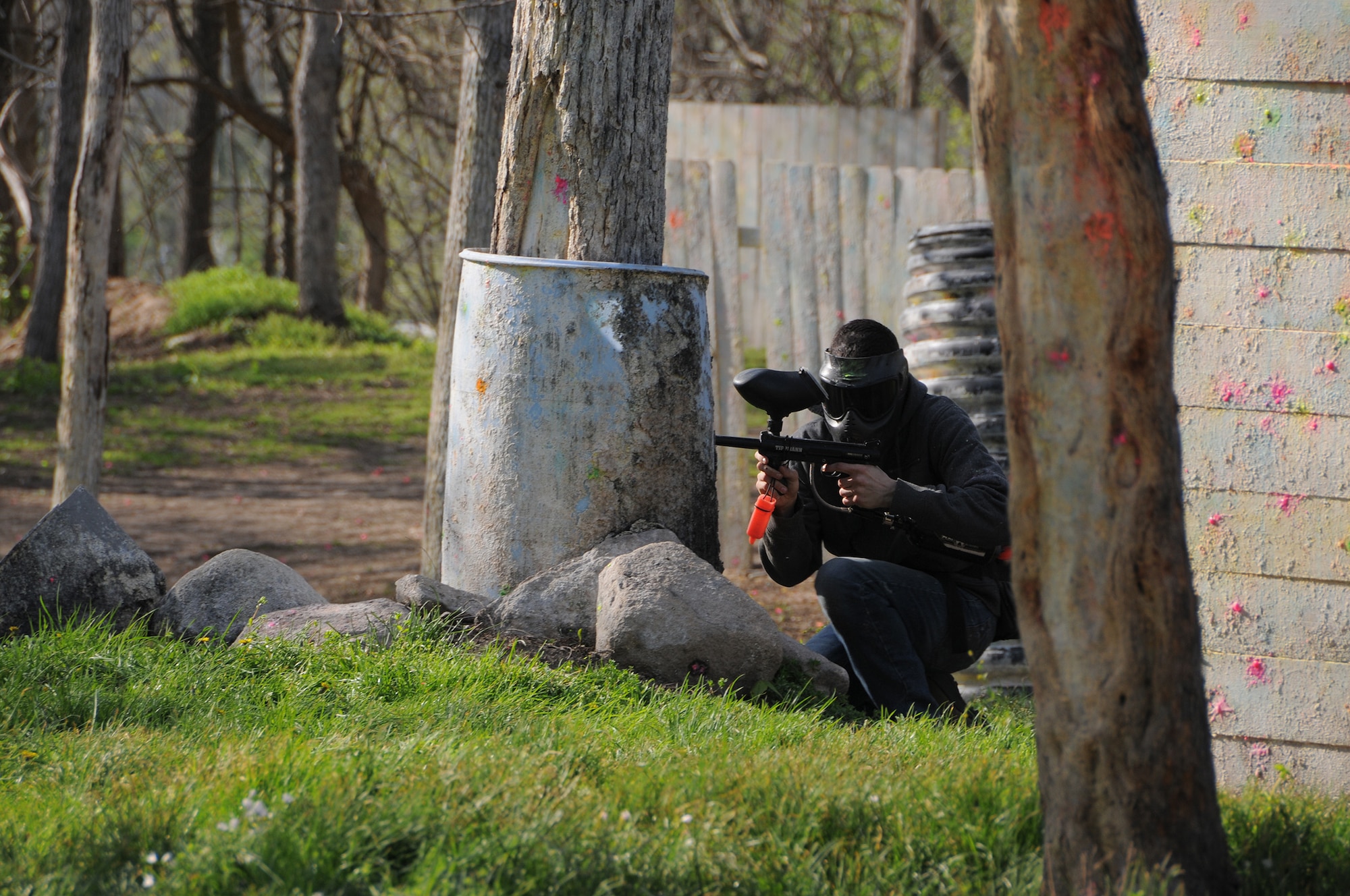 WRIGHT-PATTERSON AIR FORCE BASE, Ohio – A reservist from the 445th Airlift Wing takes part in a game of paintball during the wing's Single Airmen paintball game May 3 at the i70 Paintball in Huber Heights, Ohio. The event stemmed from the Single Airman Programming Initiative, a program that provides social and recreation opportunities through Force Support Squadron-sponsored events held during unit training assembly weekends. The program, which began rolling out around the Air Force last fall, is targeted toward officer and enlisted Airmen without a spouse. (U.S. Air Force photo/Tech. Sgt. Anthony Springer)