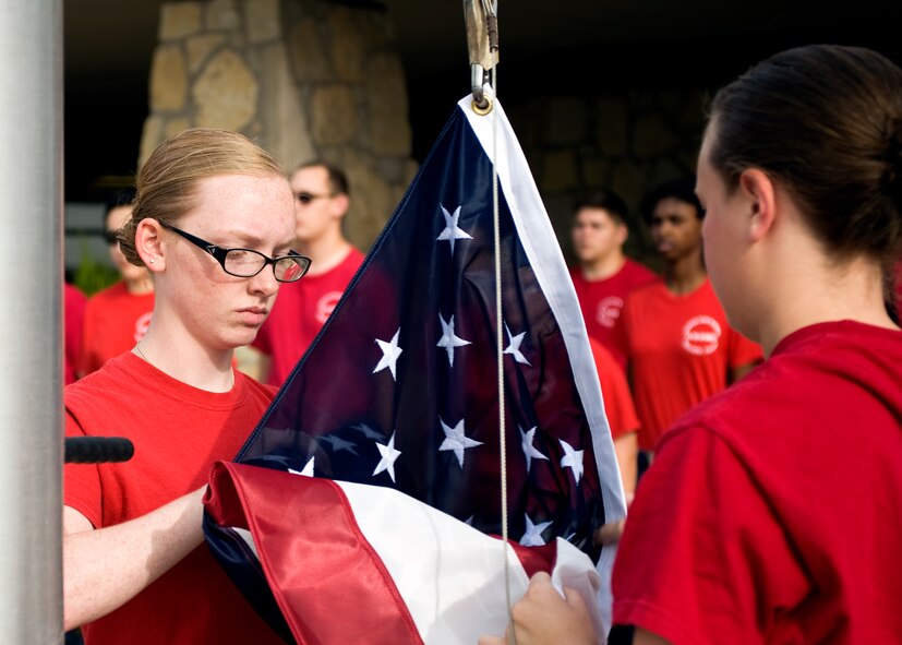 Students from Cooper High School’s Junior Reserve Officer Training Corp raise the American flag May 17, 2014, at the Abilene Zoo in Abilene, Texas. The Abilene Zoo invited all active duty, dependants and retired military to experience the zoo for free as a sign of military appreciation. (U.S. Air Force photo by Senior Airman Peter Thompson/Released)