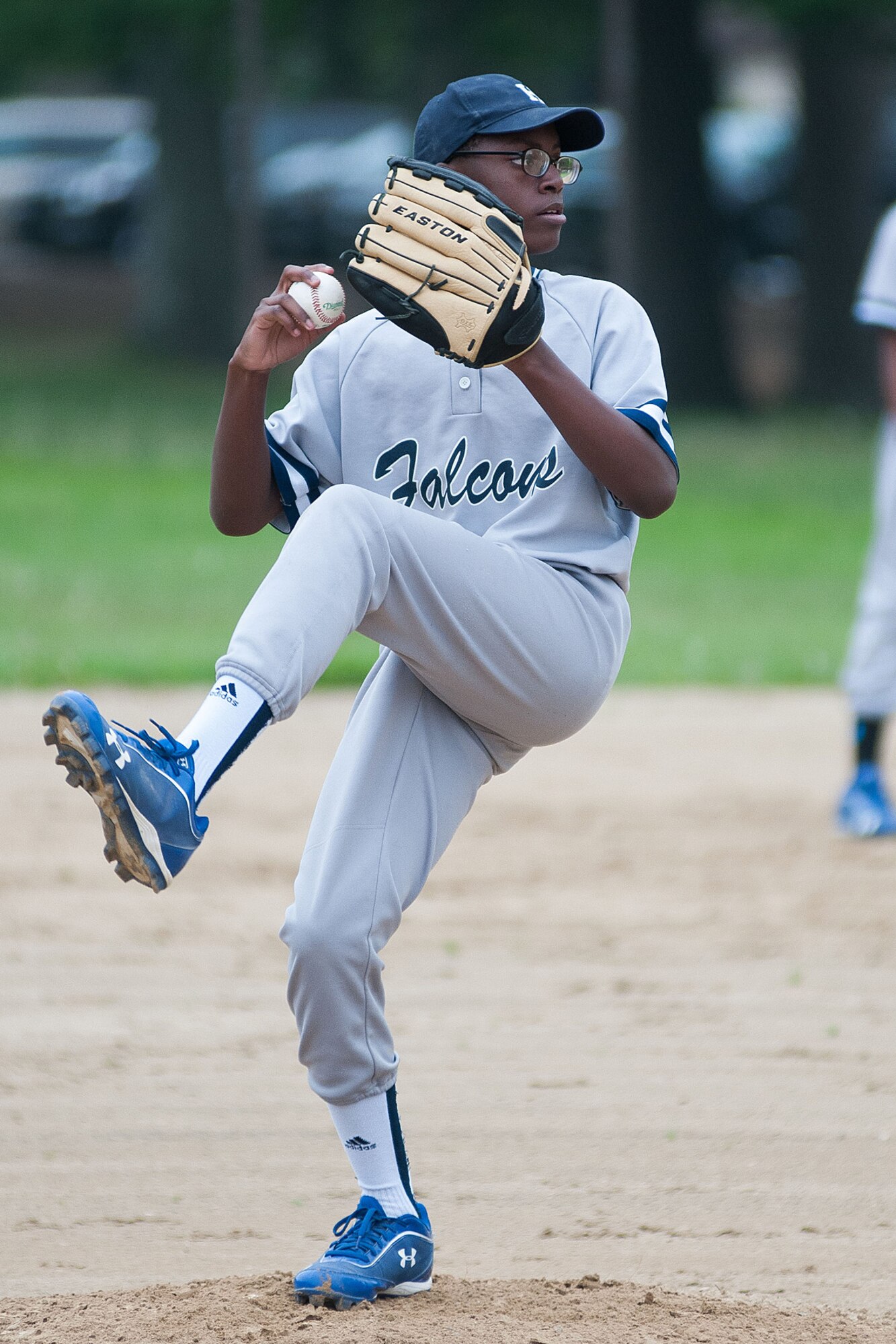 HANSCOM AIR FORCE BASE, Mass. -- Nicholas Reid, a seventh grade member of the Hansom Middle School Falcons boy’s baseball team, throws a pitch to a Lexington Clarke Middle School hitter during the team’s final home game of the season May 27. The Falcons lost the game 14-7 to drop to 1-8 on the season. The team’s one win, the first in three years, came against Lincoln May 15. (U.S. Air Force photo by Mark Herlihy)