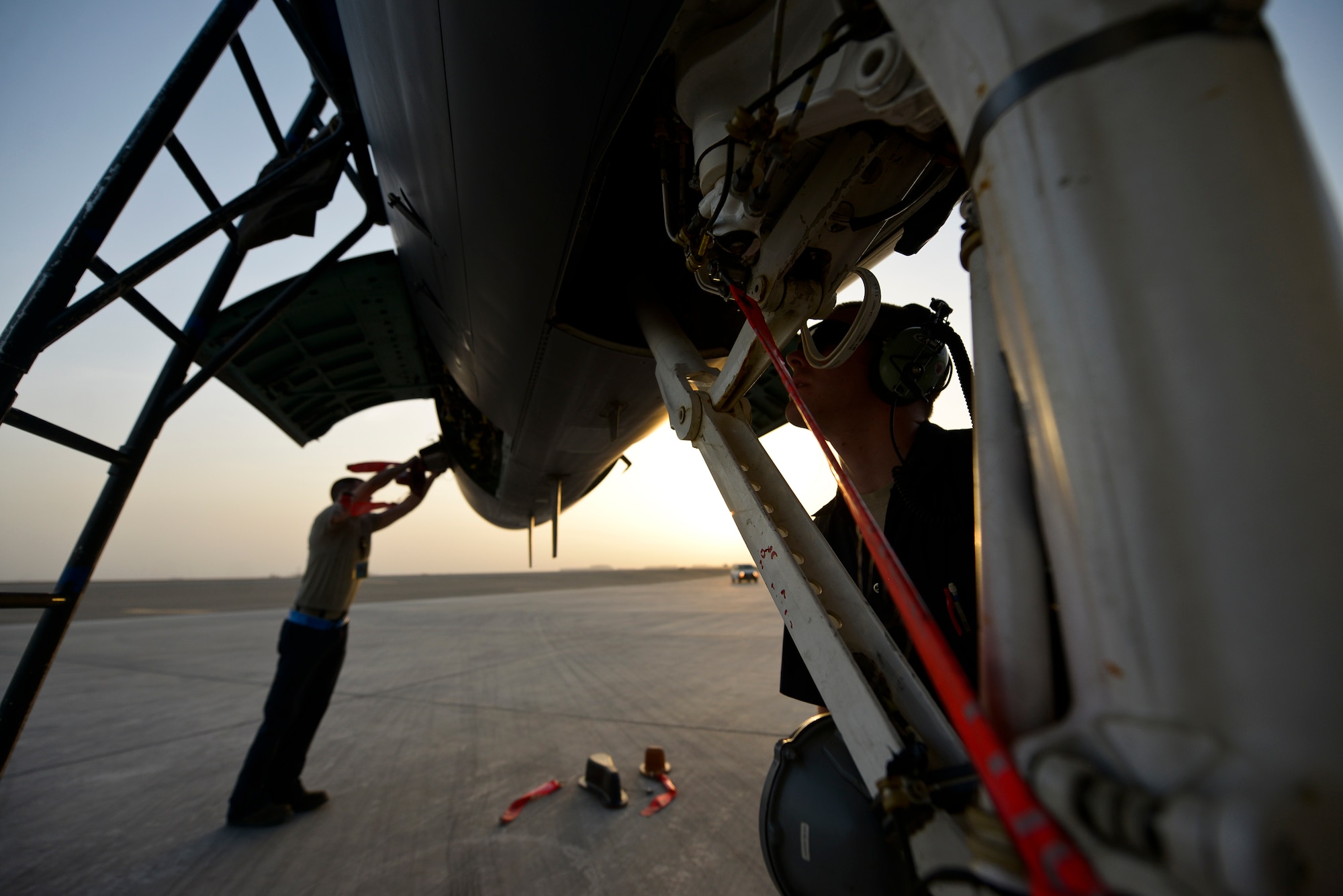 Crew chiefs from the 380th Expeditionary Aircraft Maintenance Squadron perform a post-flight inspection on an F-15E Strike Eagle May 26, 2014, at an undisclosed location in Southwest Asia. Post-flight inspections ensure that aircraft are serviceable and ready for the next day’s flight. (U.S. Air Force photo byTech. Sgt. Russ Scalf/Released)