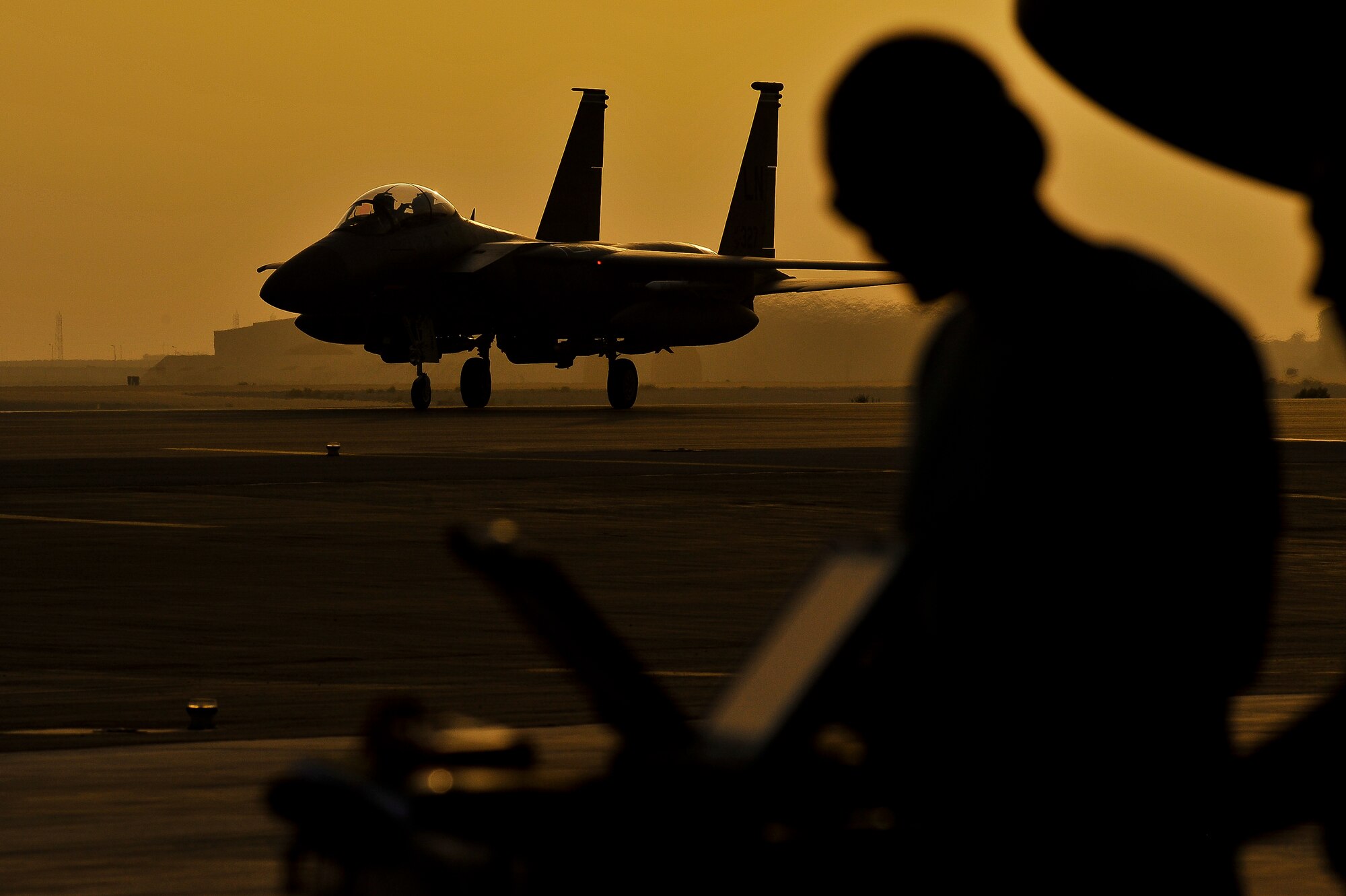An F-15E Strike Eagle taxis to a parking spot May 26, 2014, at an undisclosed location in Southwest Asia. The aircraft, deployed from Royal Air Force Lakenheath, England, is supporting Operation Enduring Freedom and Combined Joint Task Force-Horn of Africa.  (U.S. Air Force photo byTech. Sgt. Russ Scalf/Released)