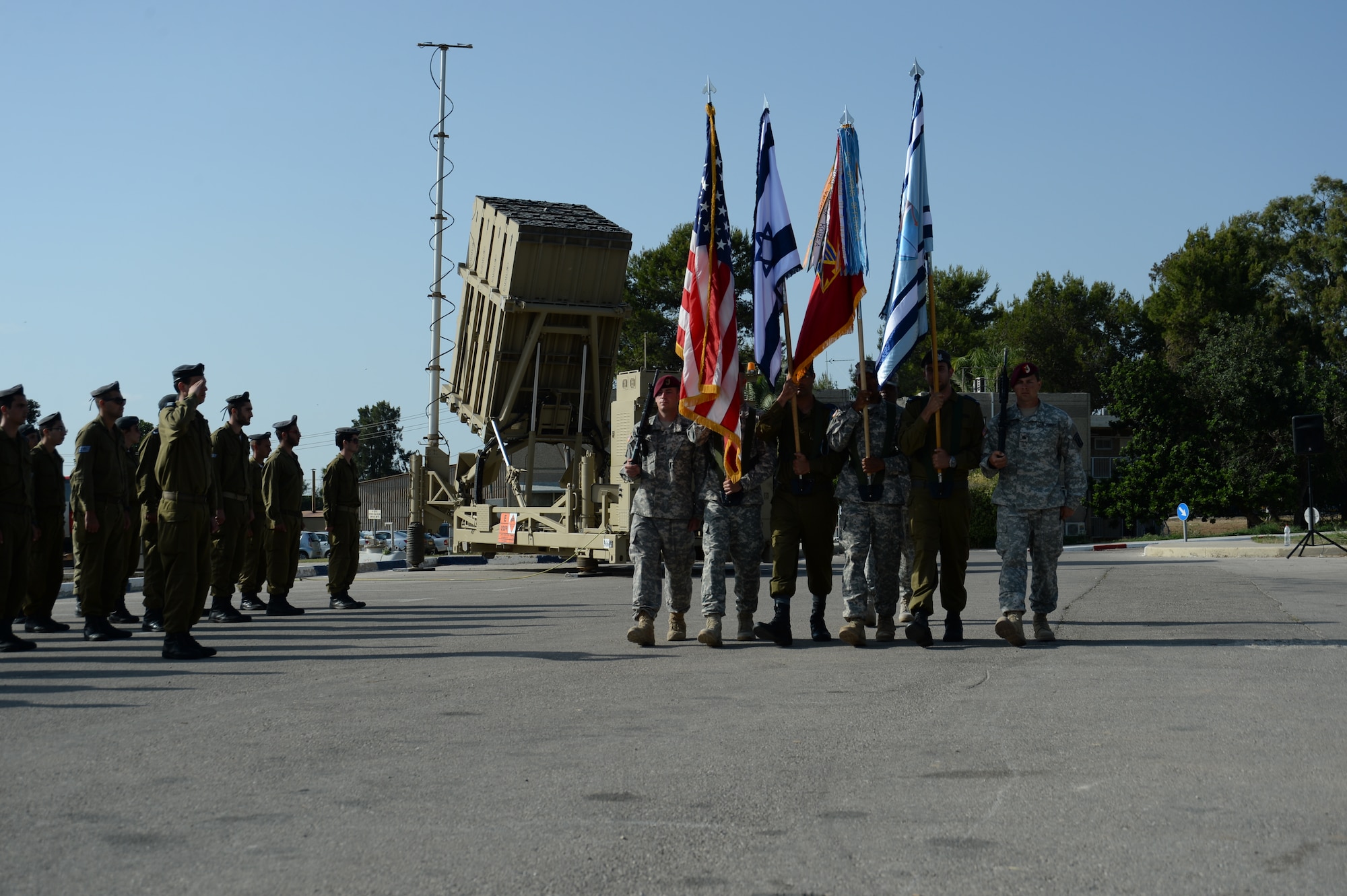 U.S. and Israeli color guard members present their national and service flags during a closing parade ceremony for the Juniper Cobra 14 bilateral exercise at Hatzor Air Base, Israel, May 22, 2014. JC14 is a combined exercise designed to improve interoperability between the two countries’ armed forces. (U.S. Air Force photo by Staff Sgt. Joe W. McFadden/Released)