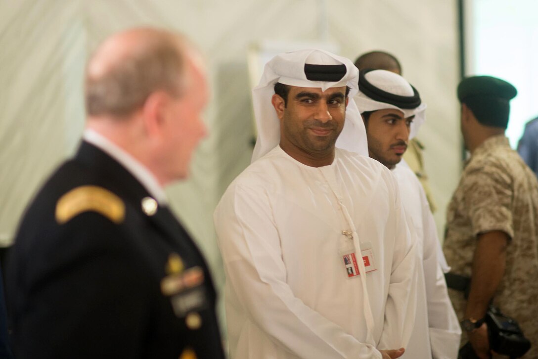 U.S. Army Gen. Martin E. Dempsey, foreground, chairman of the Joint Chiefs of Staff, talks with the U.S. and Emirati delegations conducting the Joint Strategic Military Dialogue in Abu Dhab, United Arab Emirates, May 28, 2014.