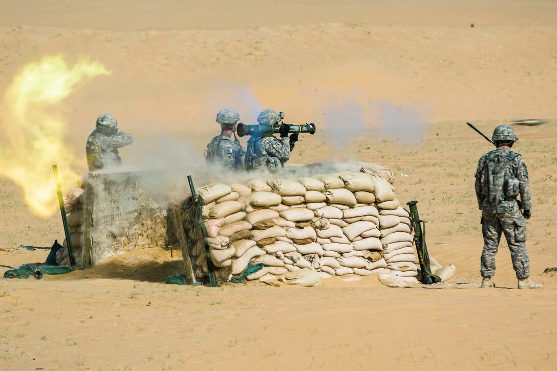 U.S. soldiers conduct a live-fire training mission near Camp Buehring, Kuwait, May 19, 2014.