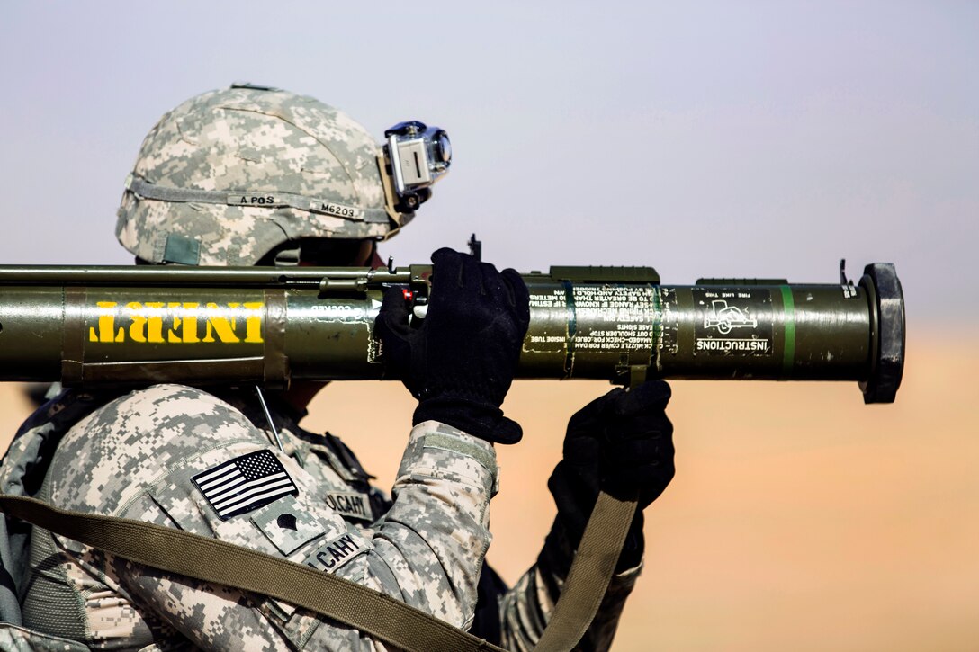 U.S. Army Spc. Mulcahy prepares to fire an AT-4 anti-tank weapon during a live-fire training mission near Camp Buehring, Kuwait, May 19, 2014. Mulcahy is assigned to the New York Army National Guard's 642nd Aviation Support Battalion, 42nd Combat Aviation Brigade.