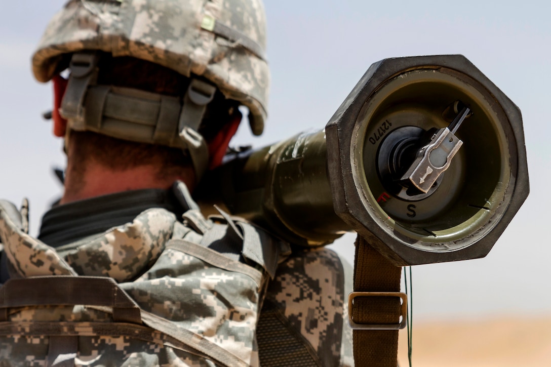 A U.S. soldier shoulders an AT-4 anti-tank weapon before conducting a ...