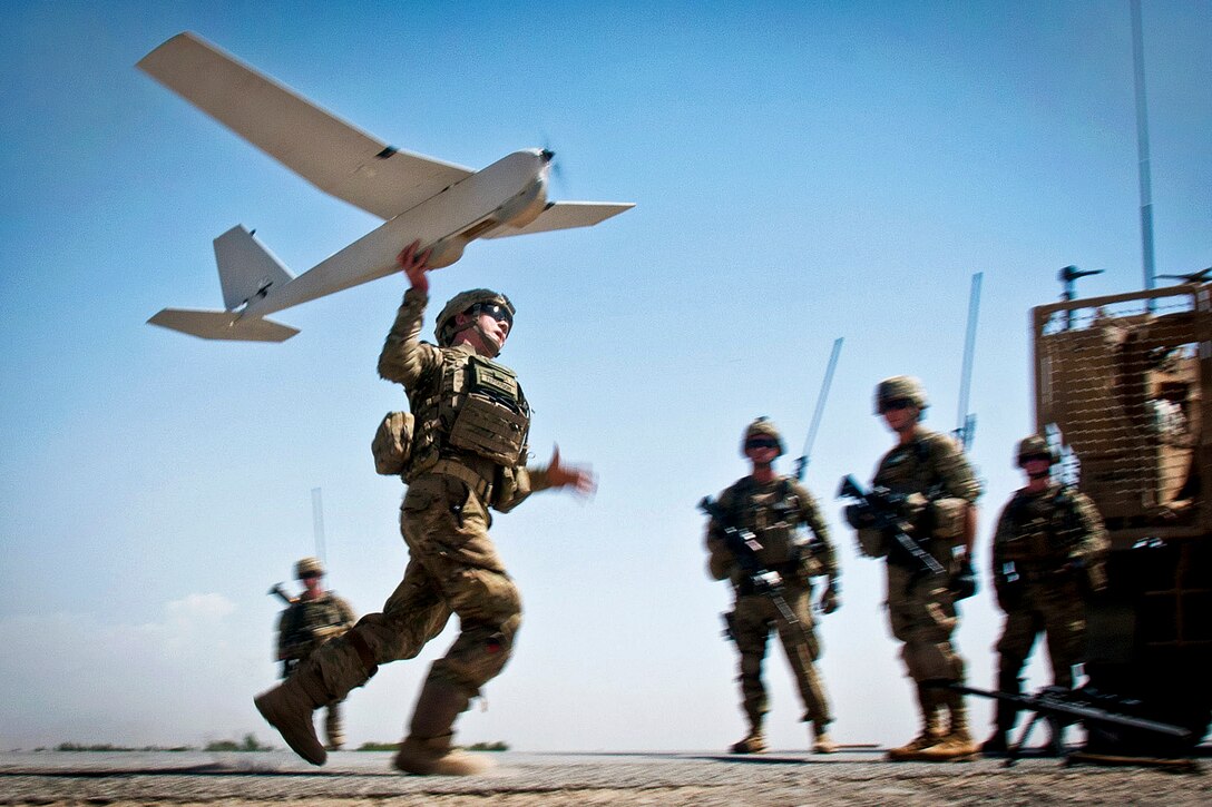 U.S. Army Chief Warrant Officer 2 Dylan Ferguson launches a Puma unmanned aerial vehicle in Afghanistan'a Ghazni province, June 25, 2012. Ferguson, a brigade aviation element officer assigned to the 82nd Airborne Division's 1st Brigade Combat Team, uses the Puma for reconnaissance for ground troops.  
