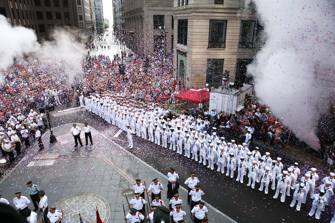 Sailors and Marines are showered with confetti during the Independence Day Parade as part of Boston Navy Week, July 4, 2012. Boston Navy Week is one of 15 signature events planned across America during 2012. The eight-day long event commemorates the Bicentennial of the War of 1812, hosting service members from the U.S. Navy, Marine Corps and Coast Guard and coalition ships from around the world.  
