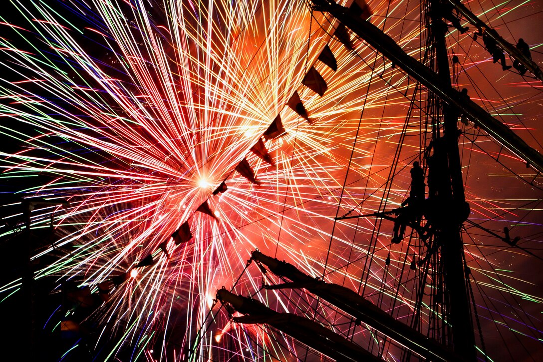 Crewmembers aboard the Coast Guard Cutter Eagle watch fireworks during Operation Sail 2012 in Norfolk, Va., June 9, 2012. Operation Sail 2012 Virginia is commemorating the bicentennial anniversary of the War of 1812.  
