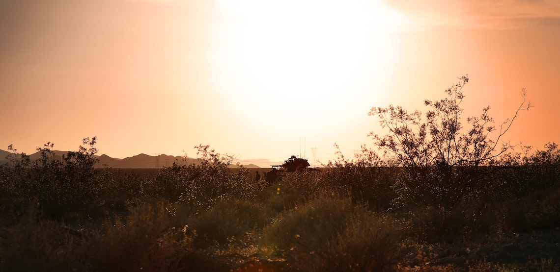 Marines with 3rd Light Armored Reconnaissance Battalion stage a light-armored reconnaissance vehicle at Training Area 2 outside the northwest boundary of the Combat Center May 12, 2014 during Desert Scimitar-14.