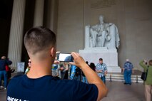 A Marine with Combat Logistics Battalion 6, Combat Logistics Regiment 2, 2nd Marine Logistics Group photographs the Lincoln Memorial in Washington, D.C., May 16, 2014. The battalion sent more than 30 noncommissioned officers to the capital in an effort to provide its junior leadership with a broader understanding of the role played by the Marine Corps in American society.