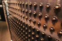 Marine and Navy insignia representing service members killed during the Battle of Iwo Jima adorn a memorial wall at the National Museum of the Marine Corps, just outside Marine Corps Base Quantico, Va., May 15, 2014. Marines from Combat Logistics Battalion 6, Combat Logistics Regiment 2, 2nd Marine Logistics Group visited the museum to deepen their appreciation for the history of sacrifice that forged the Marine Corps into what it is today.