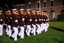 Marines march past visitors at “The Oldest Post in the Corps,” Marine Barracks Washington, D.C., May 16, 2014. Marines with Combat Logistics Battalion 6, Combat Logistics Regiment 2, 2nd Marine Logistics Group visited the barracks for the famed Evening Parade.
