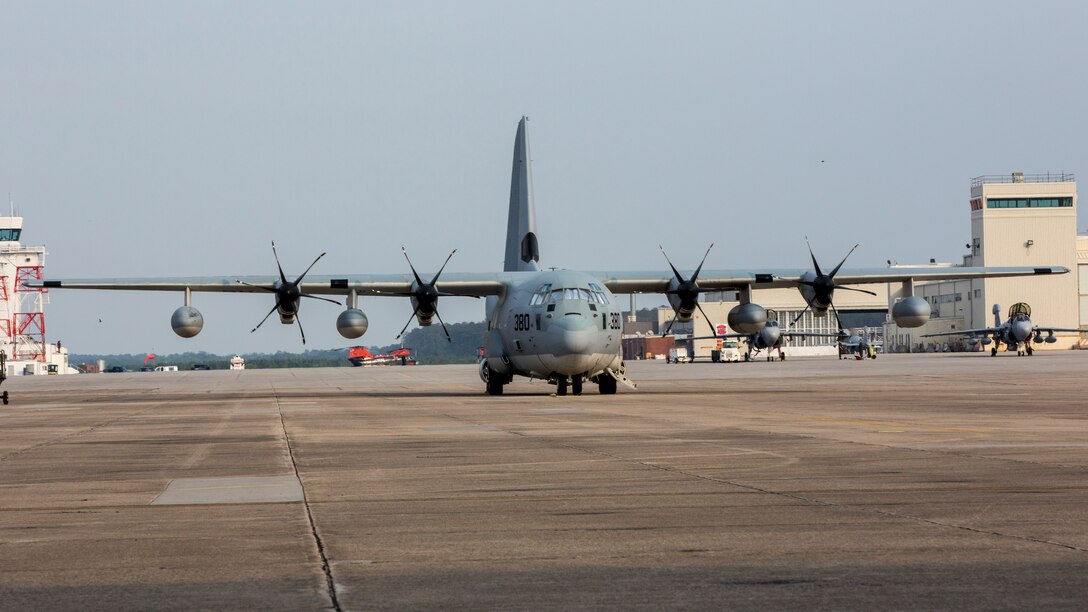 A Lockheed Martin KC-130J, an extended range transport aicraft designed for aerial refueling, sits on a Marine Aircraft Group 29 flightline at Marine Corps Air Station Cherry Point May 28, 2014. Marines assigned to the 26th Marine Expeditionary Unit (MEU) and MAG 29 participated in a briefing and demonstrations of satellite enabled internet capabilities available to Marines that are compatible with KC-130Js.