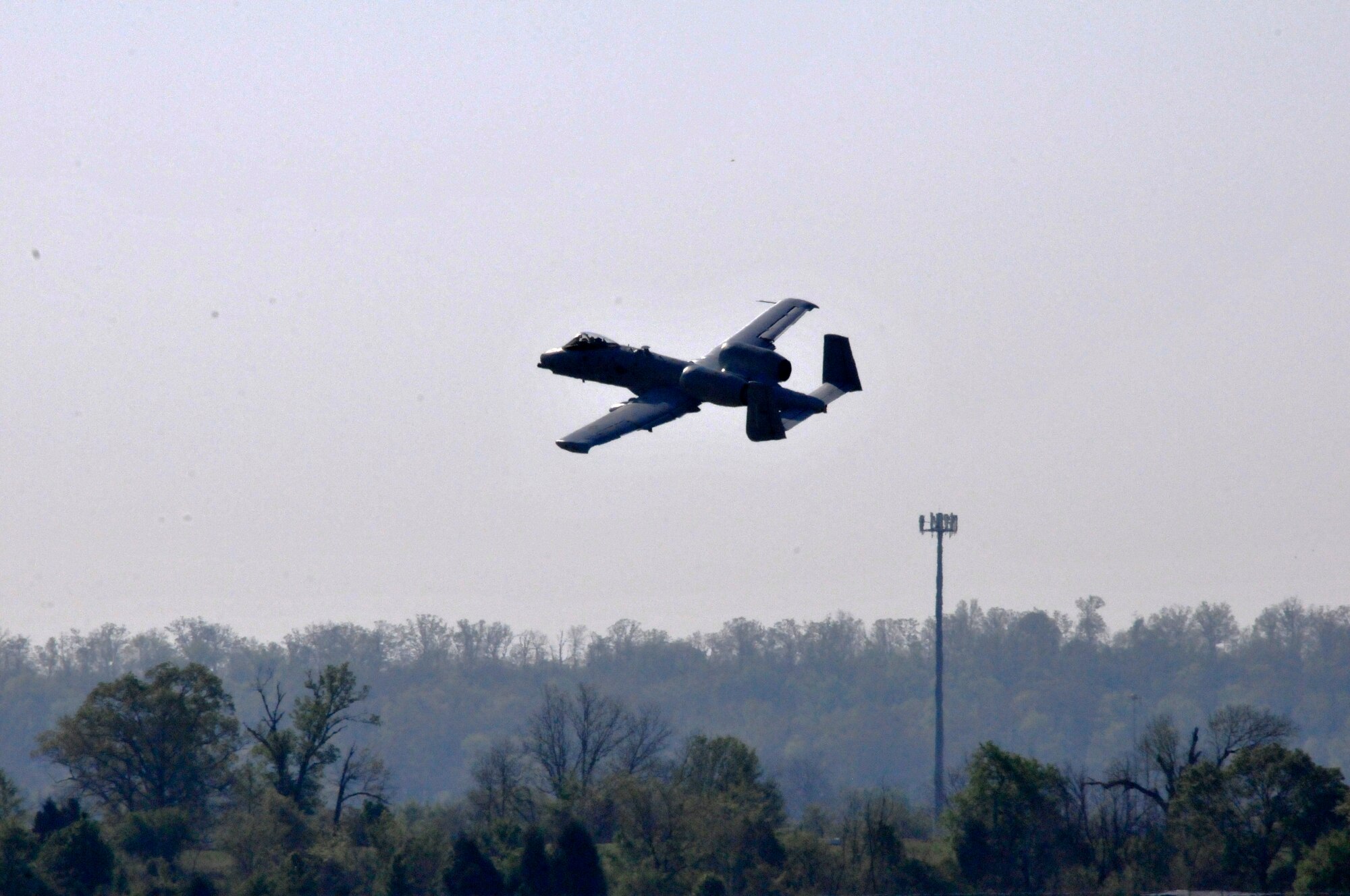 Maj. Michael Roche, a pilot with the 76th Fighter Squadron, Moody Air Force Base, Georgia., takes off in an A-10C Thunderbolt II "Warthog" (Tail No. 586). The aircraft left Ebbing Air National Guard Base, Fort Smith, Arkansas. The aircraft was delivered from the 188th Fighter Wing to Moody Air Force Base, Georgia, April 18, 2014, as part of the 188th's mission conversion from the A-10 to a remotely piloted aircraft, intelligence and targeting mission. The 188th has three remaining A-10s on station. The final two aircraft are scheduled to leave the 188th June 7, 2014. (U.S. Air National Guard photo by Tech Sgt. Josh Lewis/Released)