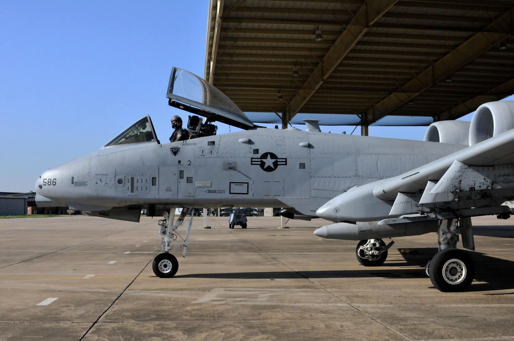 Maj. Michael Roche, a pilot with the 76th Fighter Squadron, Moody Air Force Base, Georgia, taxies an A-10C Thunderbolt II "Warthog" (Tail No. 586). The aircraft left Ebbing Air National Guard Base, Fort Smith, Arkansas was delivered to Moody Air Force Base, Georgia, April 18, 2014, as part of the 188th's mission conversion from the A-10 to a remotely piloted aircraft, intelligence and targeting mission. The 188th has three remaining A-10s on station. (U.S. Air National Guard photo by Tech Sgt. Josh Lewis/Released)