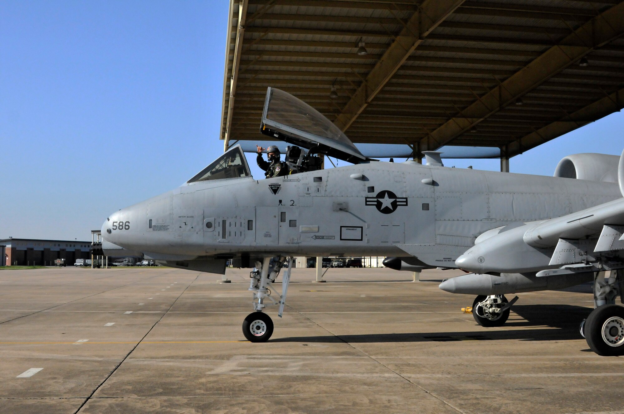 Maj. Michael Roche, a pilot with the 76th Fighter Squadron, Moody Air Force Base, Georgia, taxies an A-10C Thunderbolt II "Warthog" (Tail No. 586). The aircraft left Ebbing Air National Guard Base, Fort Smith, Arkansas was delivered to Moody Air Force Base, Georgia, April 18, 2014, as part of the 188th's mission conversion from the A-10 to a remotely piloted aircraft, intelligence and targeting mission. The 188th has three remaining A-10s on station. (U.S. Air National Guard photo by Tech Sgt. Josh Lewis/Released)