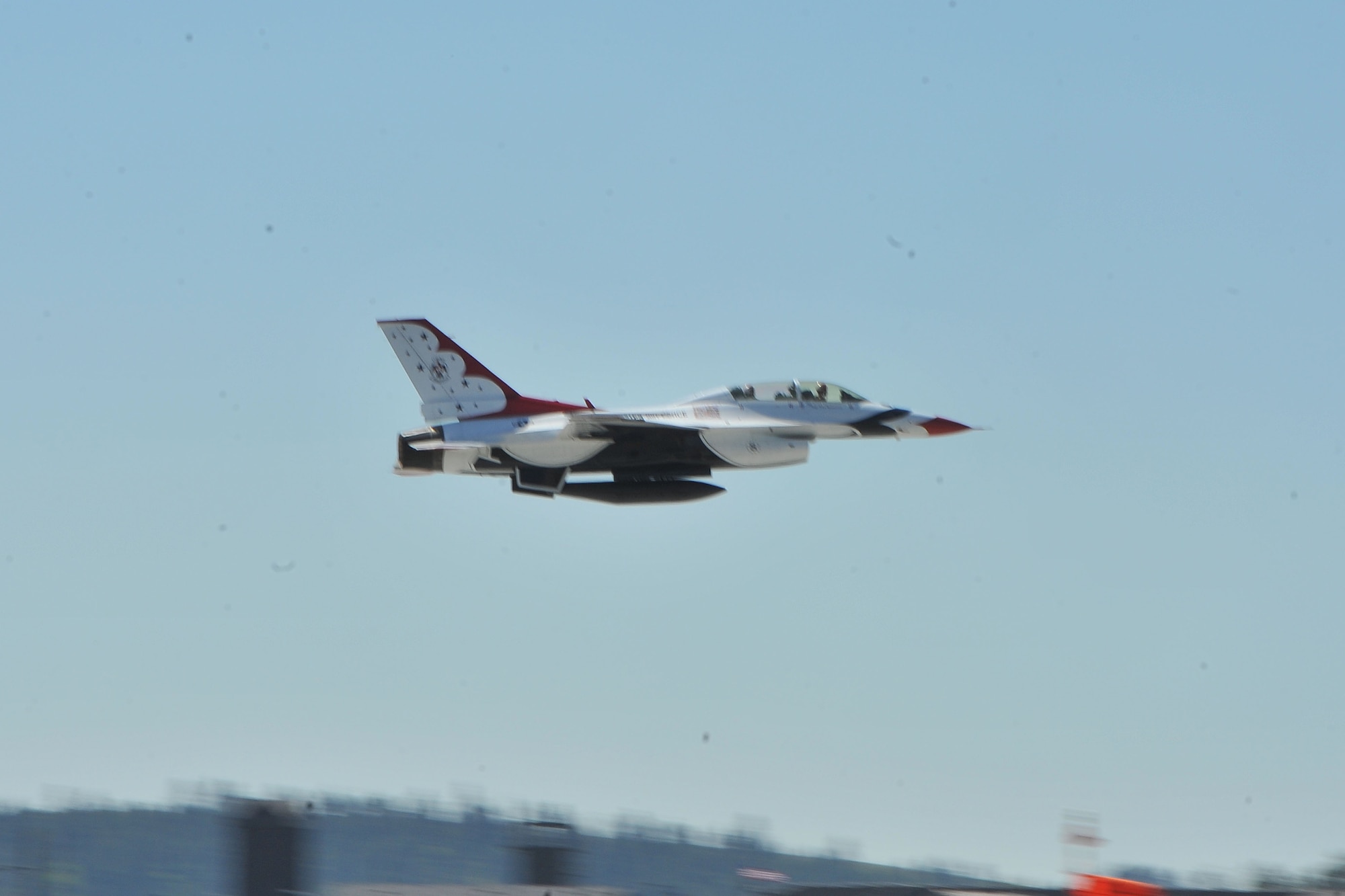 The U.S. Air Force Thunderbirds F-16 Fighting Falcon takes off from the flightline at Fairchild Air Force Base, Wash., May 30, 2014.  The flight was an orientation flight for Robyn Nance, KXLY news anchor, the day prior to SkyFest 2014.  (U.S. Air Force photo by Staff Sgt. Veronica Montes)