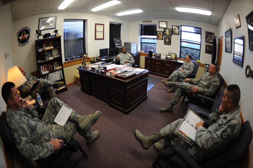U.S. Staff Sgt. Stephanie Blank, 7th Security Forces Squadron, sits in on a group chief’s meeting April 3, 2013, at Dyess Air Force Base, Texas. Chief Master Sgt. Eddie Webb, 7th Bomb Wing command chief, has implemented a new program where he spends two days a month with an Airman: “Thursdays with Chief” and “Chief’s Turn to Learn.” The selectee sits in on the wing agency staff meeting, group chief’s meeting, luncheons, teleconferences, personnel meetings and does physical training at the end of the day.  (U.S. Air Force photo by Senior Airman Shannon Hall/Released)
