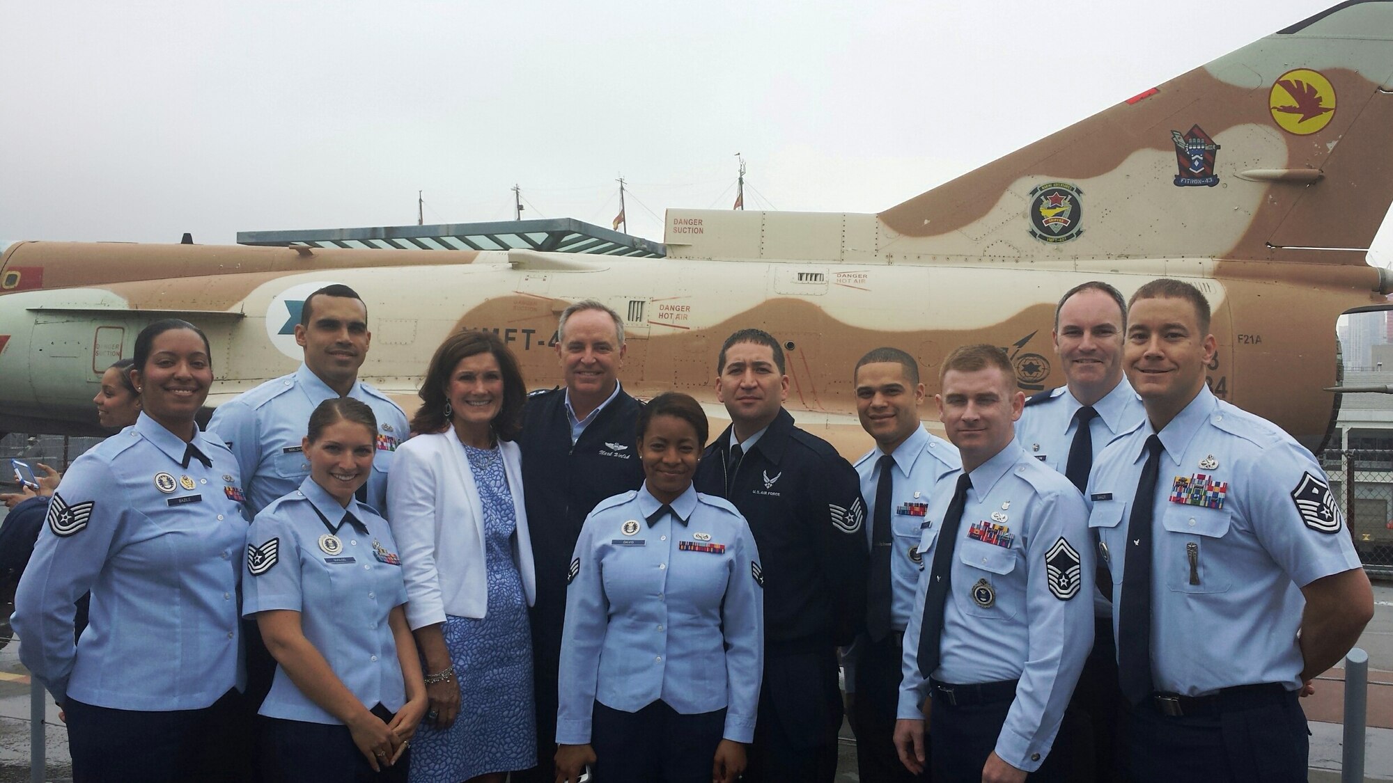 Air Force Chief of Staff Gen. Mark A. Welsh III and his wife, Betty, spent several days in New York City conducting media and civic engagements. On May 15, they met with 21 Airmen from the 313th and 314th Recruiting Squadrons and the Manhattan College Air Force ROTC Detachment 560. The general spoke over lunch about future Air Force capabilities, force shaping, master sergeant boards, changes to the enlisted evaluation system, sequestration impacts and the evolution of Air Force culture. Welsh stressed that recruiters play a critical role in indoctrinating new Airmen into Air Force culture and its Core Values. ABOVE – Aboard the USS Intrepid Sea, Air and Space Museum in New York City are, from left: Tech. Sgt. Dana Bazile, Tech. Sgt. Gervacio Maldonado, Tech. Sgt. Jaclyn Duclos, Betty Welsh, Gen. Mark A. Welsh III, Senior Airman Jazmen Davis, Tech. Sgt. Charles Goff, Senior Airman Edwar Rivas-Espinal, Senior Master Sgt. Brad Pearson, Lt. Col. John Hutcheson and Master Sgt. George Baker. (U.S. Air Force photo)