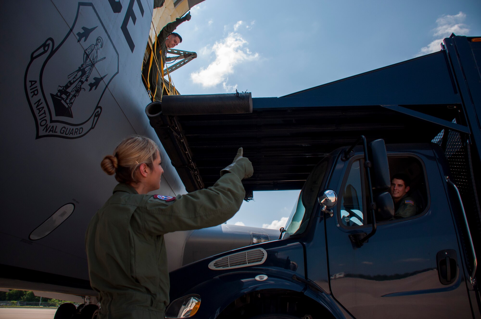 Members of the 137th Oklahoma Air National Guard Aeromedical Evacuation Squadron prepare to transfer medical equipment to a KC-135R Stratotanker for a joint medical and refueling mission on May 29th, 2014 at Tinker Air Force Base. (U.S. Air Force Photo/Senior Airman Mark Hybers)