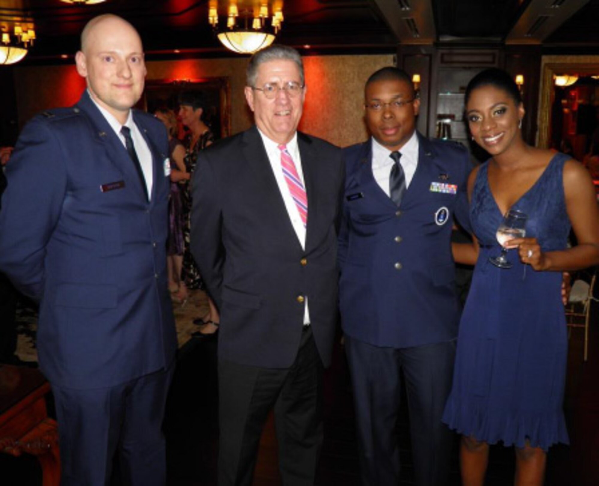 Members of the 314th Recruiting Squadron helped recognize outstanding educators at WDHA’s 7th Annual Teachers Who Rock Awards Banquet in Livingston, N.J., April 28. From left are Capt. Nathan D. Goetsch, 314th RCS Support Flight commander; Tony Odachowski, director of the Greater Media New Jersey Interactive and Non-traditional Revenue; Capt. Omar Johnson, 314th RCS Operations Flight commander; and Sharee Johnson. (Courtesy photo)