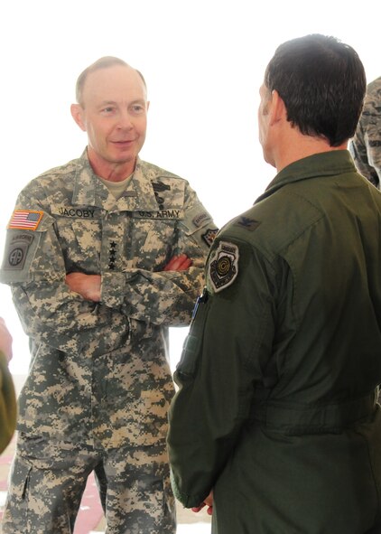 Army Gen. Charles H. Jacoby, commander of North American Aerospace Defense Command and U.S. Northern Command speaks with 180th Fighter Wing Commander Col. Craig R. Baker at the 180th Fighter Wing, Toledo, Ohio, May 28, 2014. The North American Aerospace Defense Command (NORAD) is a United States and Canada bi-national organization charged with the missions of aerospace warning and aerospace control for North America.  (Ohio Air National Guard photo by Staff Sgt. Amber Williams/Released)