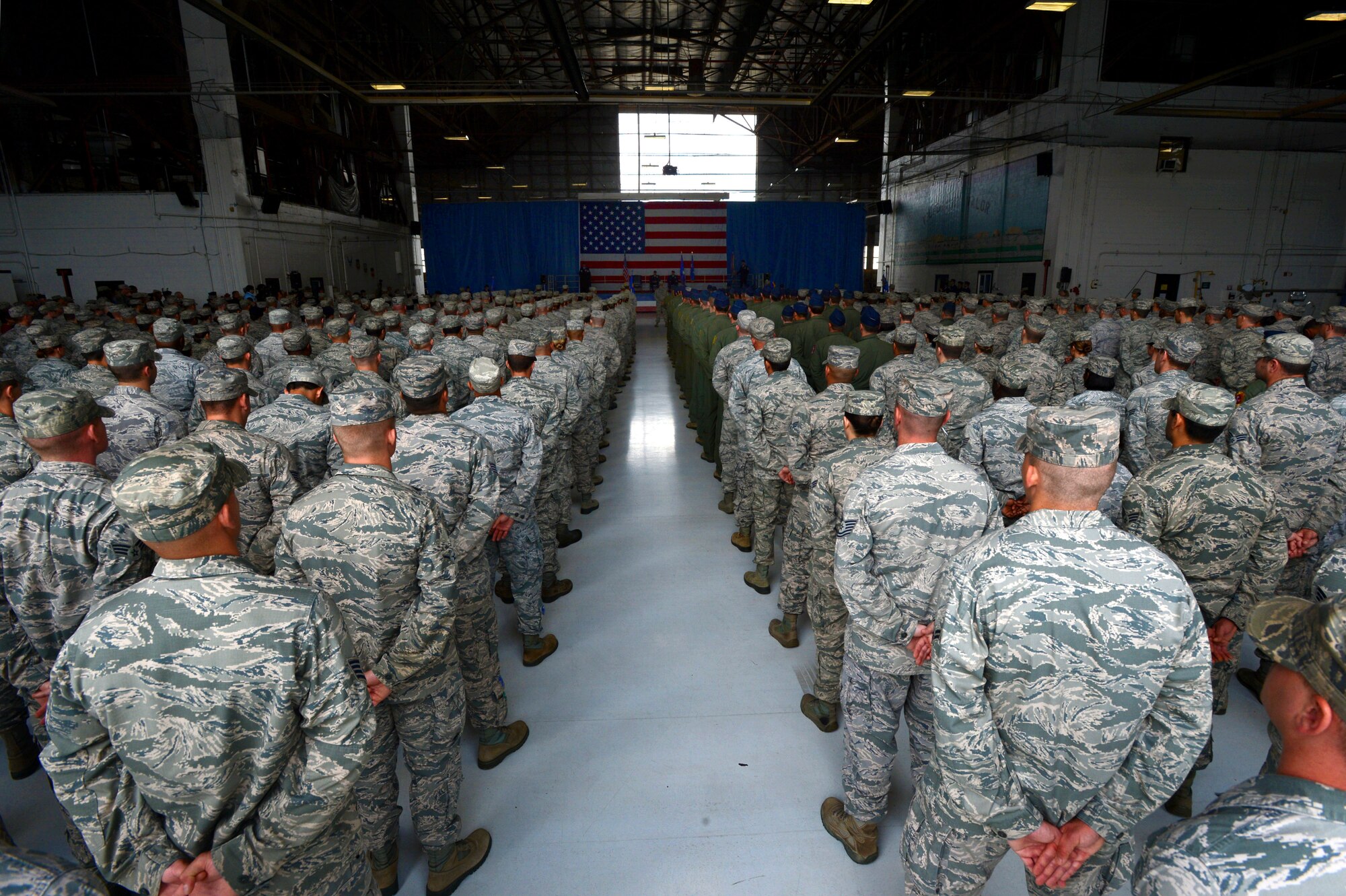 U.S. Air Force Airmen from the 20th FW watch a change of command ceremony at Shaw Air Force Base, S.C., May 30, 2014. More than 700 Airmen, soldiers, civilians and family members attended the event to welcome U.S. Air Force Col. Stephen Jost, the new 20th FW commander, and say goodbye to Col. Clay Hall, the incoming Ninth Air Force, director of operations. (U.S. Air Force photo by Airman 1st Class Jensen Stidham/Released)