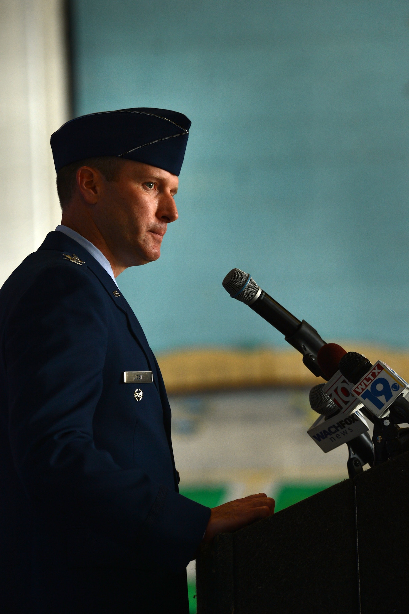 U.S. Air Force Col. Stephen Jost, 20th Fighter Wing commander, speaks during the 20th FW change of command ceremony at Shaw Air Force Base, S.C., May 30, 2014. Jost spoke to more than 700 attendees and vowed to take care of Airmen and their families, to not let the mission fail and to be a good steward of the base’s resources during his command tenure. (U.S. Air Force photo by Airman 1st class Jensen Stidham/Released)