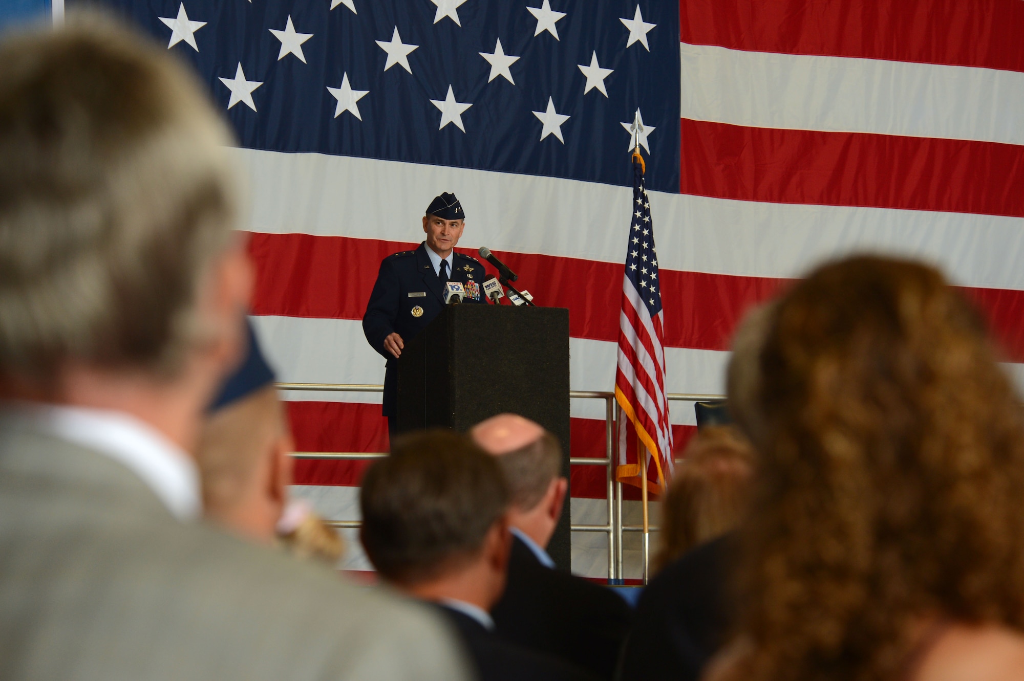 U.S. Air Force Maj. Gen. Jake Polumbo, Ninth Air Force commander, speaks during the 20th Fighter Wing change of command at Shaw Air Force Base, S.C., May 30, 2014. Polumbo, the presiding officer, spoke to the more than 700 attendees about his excitement for Col. Stephen Jost, the new 20th FW commander, and the accomplishments of former 20th FW commander Col. Clay Hall, now Ninth Air Force director of operations (U.S. Air Force photo by Airman 1st class Jensen Stidham/Released)