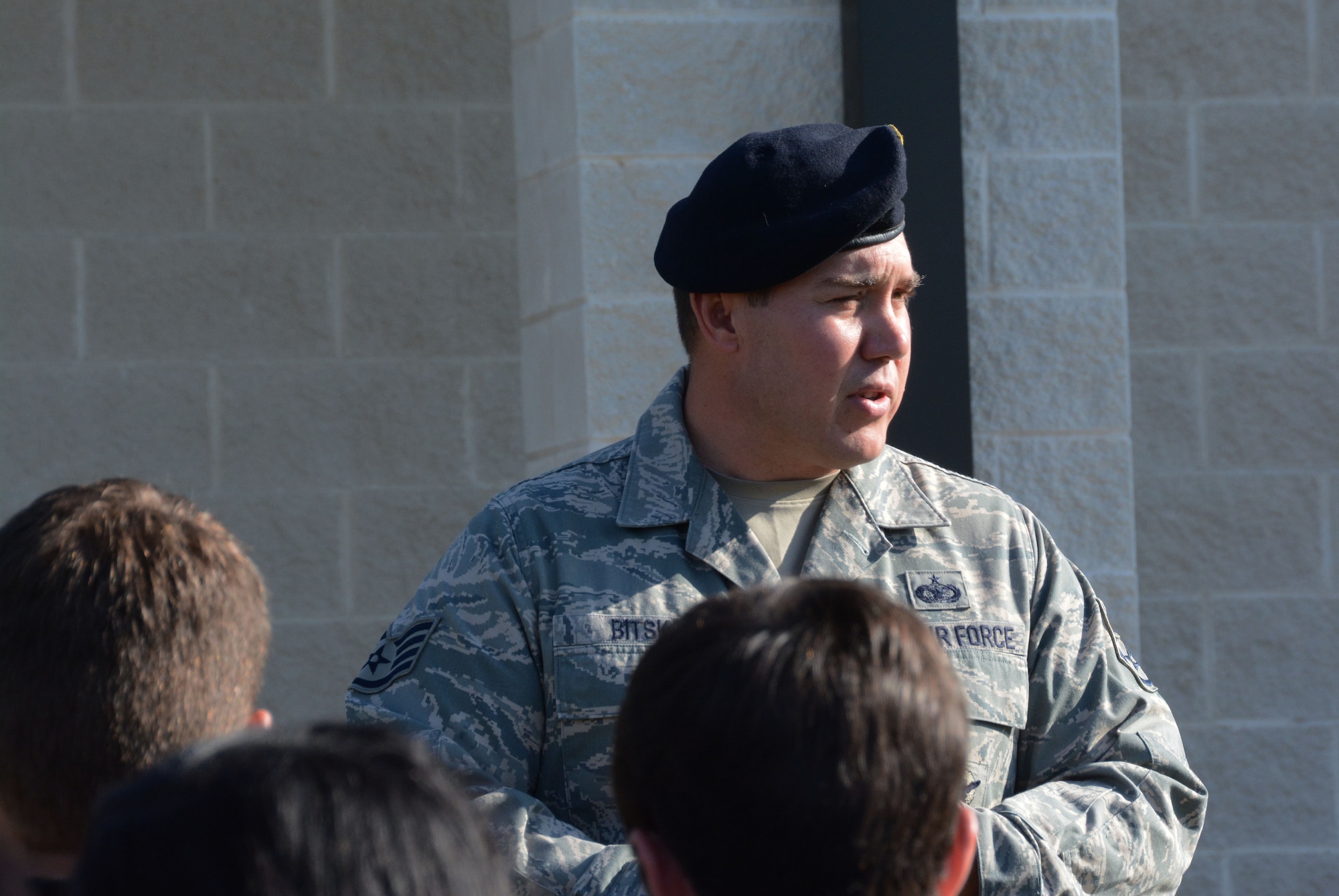 Staff Sgt. Stephen M. Bitsko, 610th Security Forces Squadron instructor, briefs students from Madison, Mississippi, May 29, 2014, Naval Air Station Fort Worth Joint Reserve Base, Texas. Members of the Junior Reserve Officer Training Corps, Madison Central High School, visit the 301st Fighter Wing to learn about the different career fields the Air Force has to offer. (U.S. Air Force photo by Staff Sgt. Samantha A. Mathison)